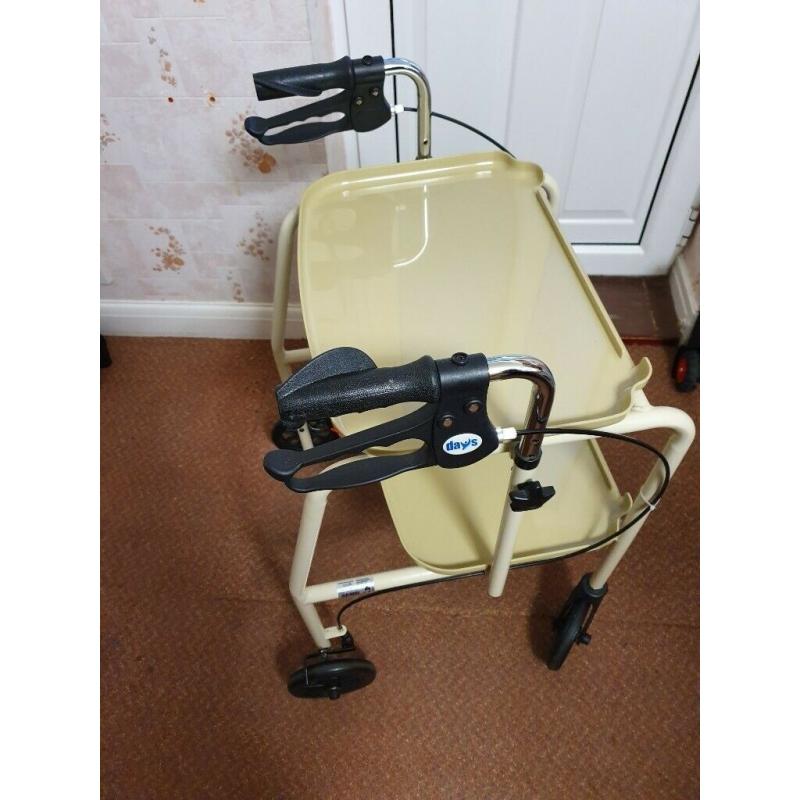 Walking aid wheeled trolley with shelves braked . Scarborough area