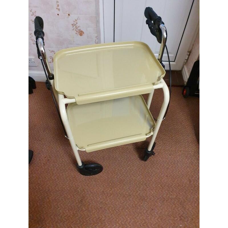 Walking aid wheeled trolley with shelves braked . Scarborough area