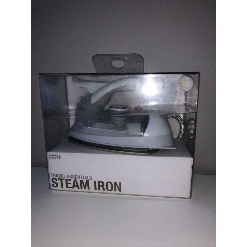 Travel Iron (Marks & Spencer) perfect to iron Masks ready to sell