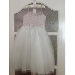 Children 's party dresses aged 4 ,104cm and aged 5 which is 110 cm never worn brand new