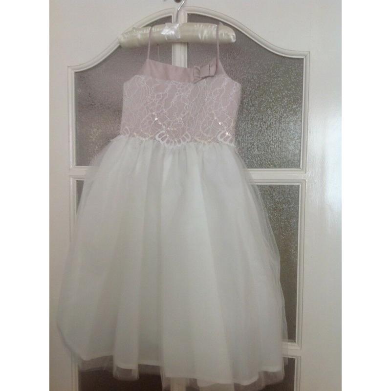 Children 's party dresses aged 4 ,104cm and aged 5 which is 110 cm never worn brand new