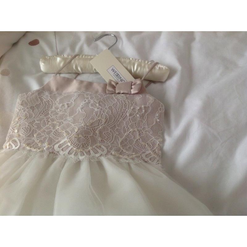 Children 's party dresses aged 4 ,104cm and aged 5 which is 110 cm never worn brand new