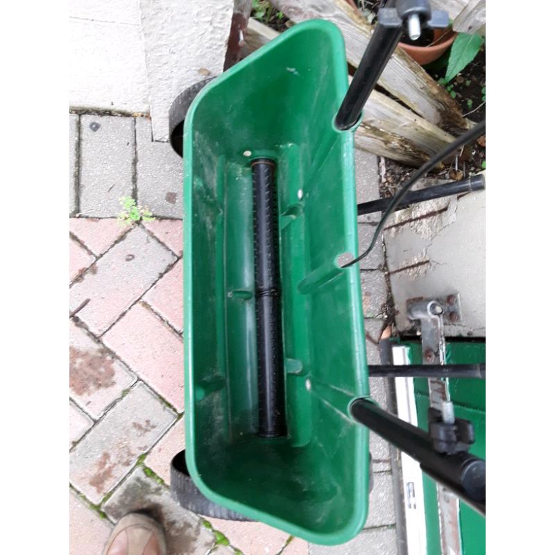 Evergreen lawn spredder