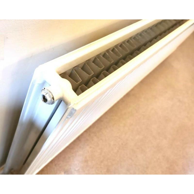 FREE 2 Radiators 1 very large 2 metre double convector. with valves 1 medium 1.5 metre single