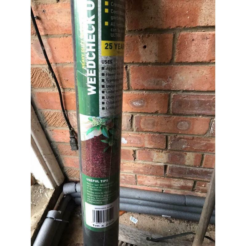 Heavy duty weed control fabric