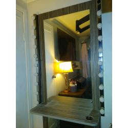 Mirror styling unit