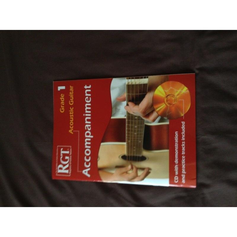 RGT accompaniment book for grade 1 acoustic guitar, new, unused.