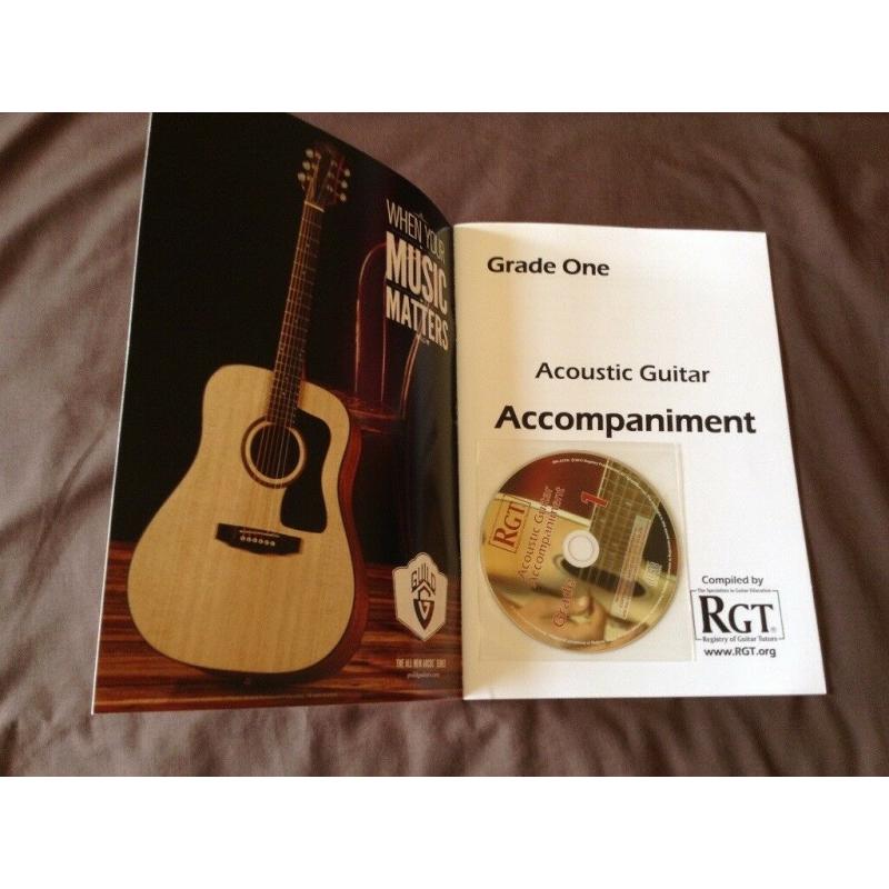 RGT accompaniment book for grade 1 acoustic guitar, new, unused.