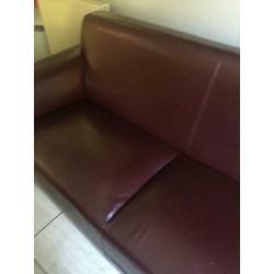 Burgundy leather/vinyl sofa