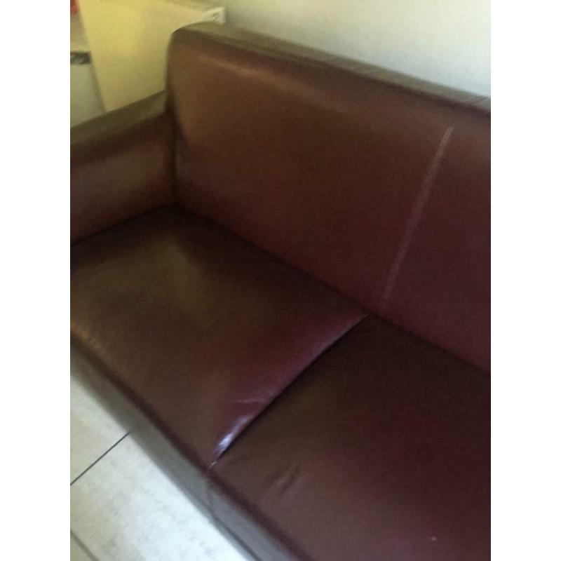 Burgundy leather/vinyl sofa