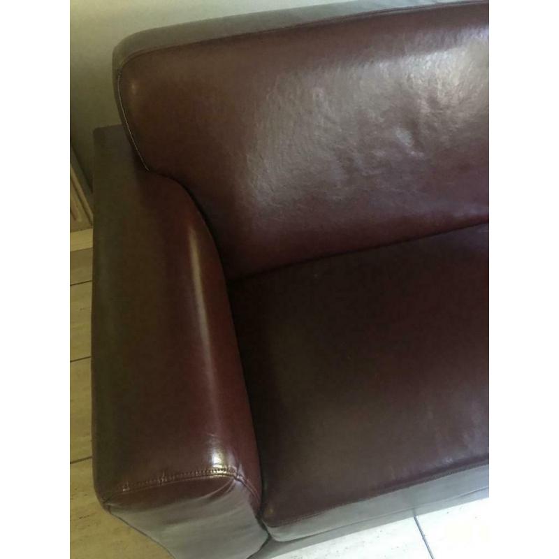 Burgundy leather/vinyl sofa