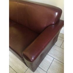Burgundy leather/vinyl sofa