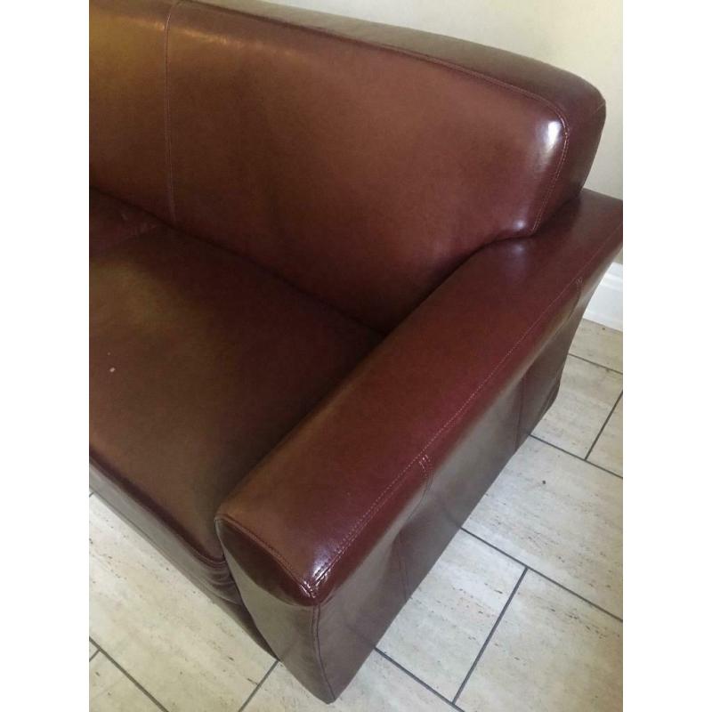 Burgundy leather/vinyl sofa