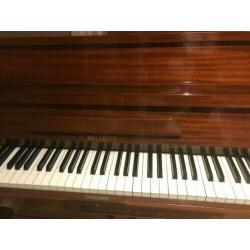 A Bellette walnut veneered Art Deco overstrung piano