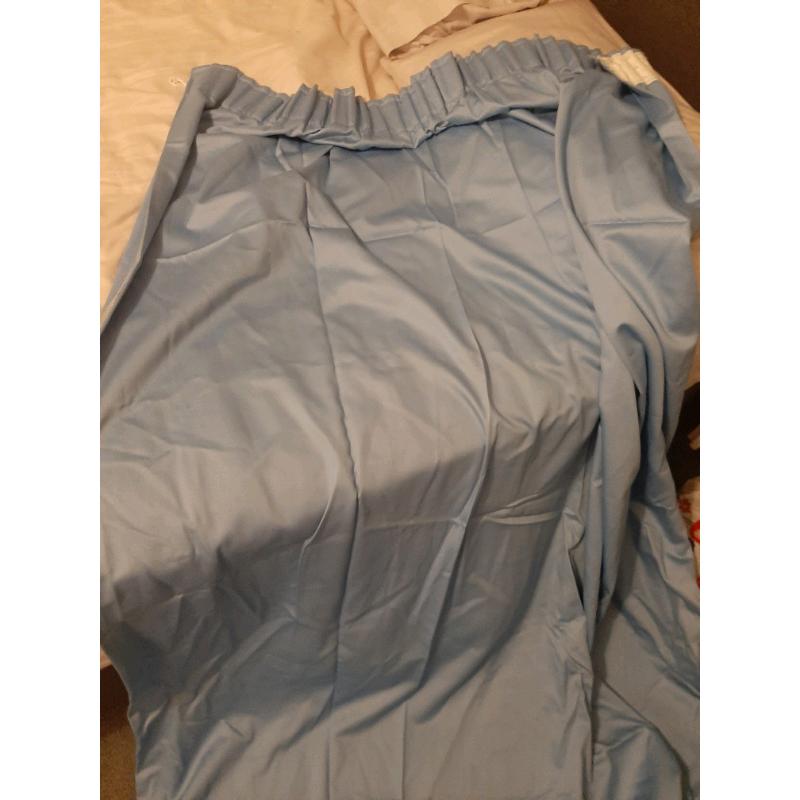 Pair pale blue curtains