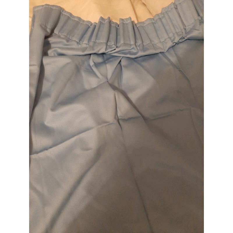 Pair pale blue curtains