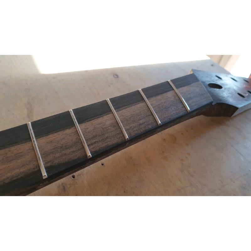 Guitar + musical instrument repairs - service
