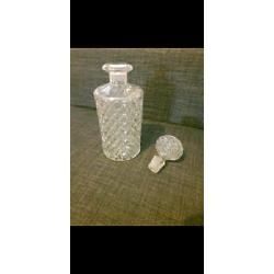 Decanter and 2 matching brandy glasses in dark wood display stand