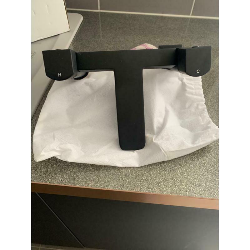 Matte black bath filler