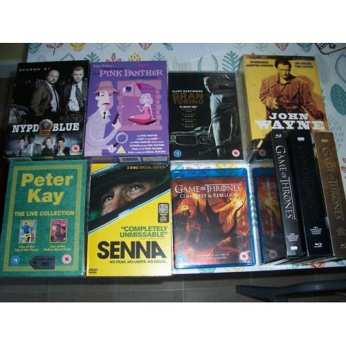 DVD player plus remotes plus numerous 19 most unopened DVD's only ?10 the lot BARGAIN.