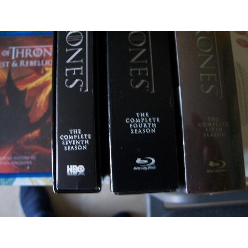 DVD player plus remotes plus numerous 19 most unopened DVD's only ?10 the lot BARGAIN.