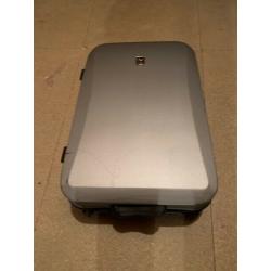 Silver medium sized hard shell suitcase