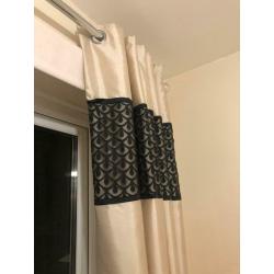 Gold and black matching curtains and bedding will accept offers